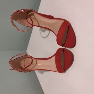 Red heel sandals.